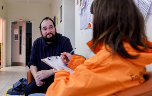 St Mungo's staff talking with a man